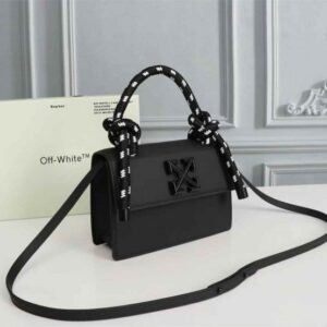 Off-White Leather Insert Black Gummy with Metallic Black Arrows At Front. Rope Handle Jitney 1.4 Shoulder Bag (D88532 Black)